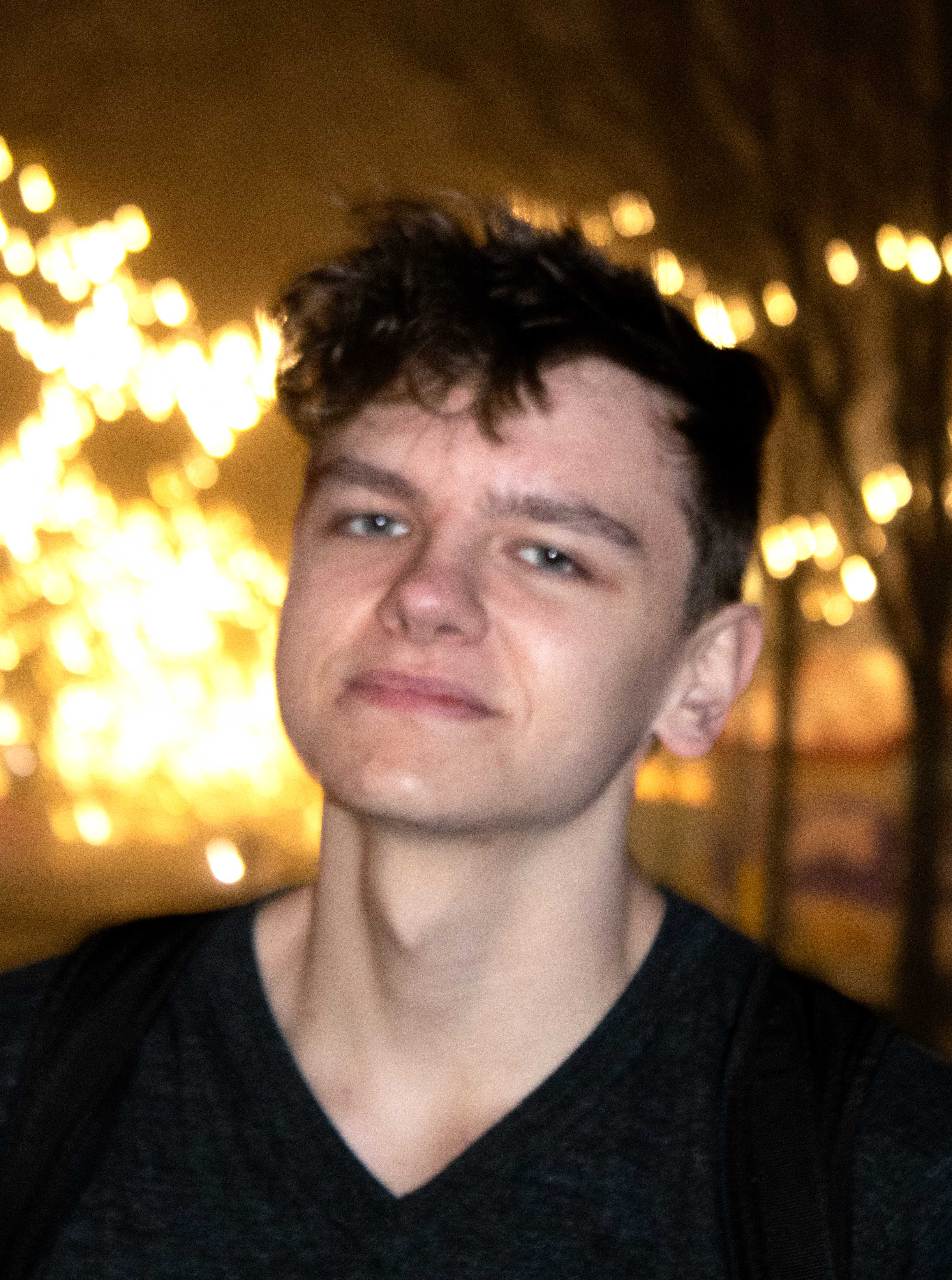 Man with ligh behind him